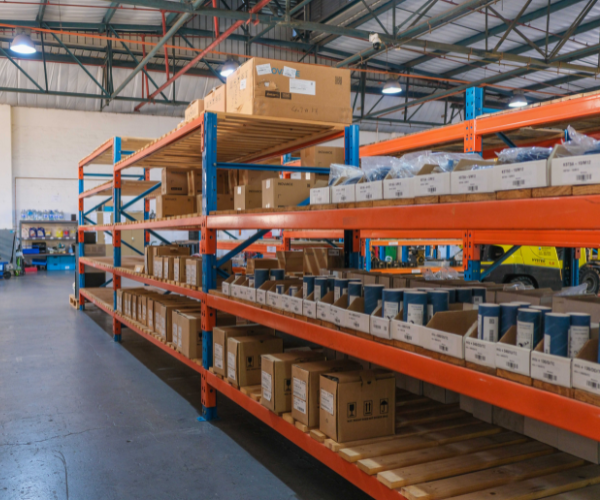 Warehouse shelving stocked with automation spare parts