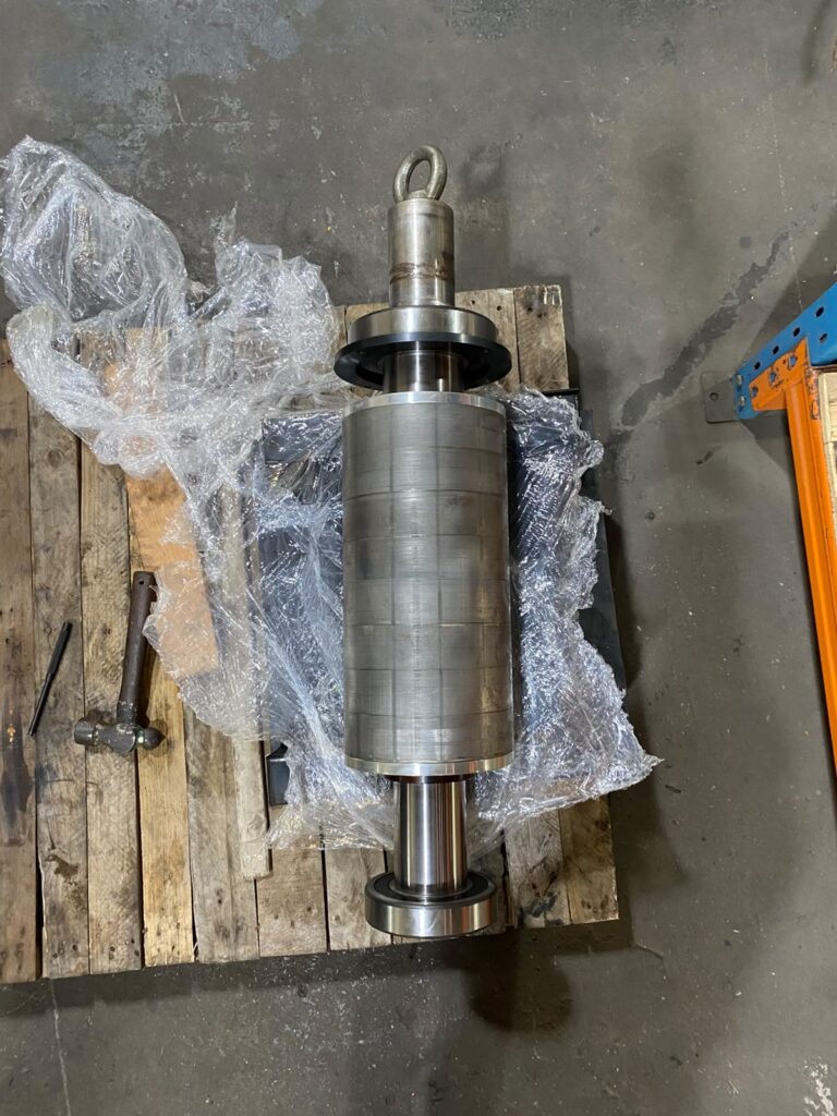 Servo motor rotor wrapped in plastic on a pallet