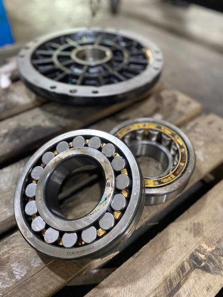 Worn roller bearings removed from the Modrol servo motor
