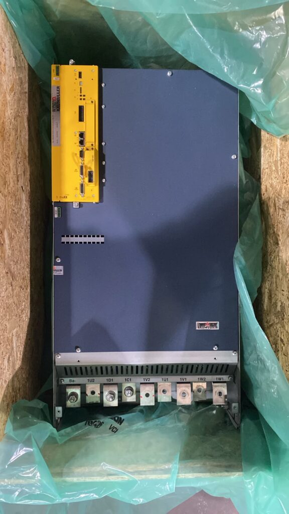 Water-cooled Baumüller drive packed in its shipping crate